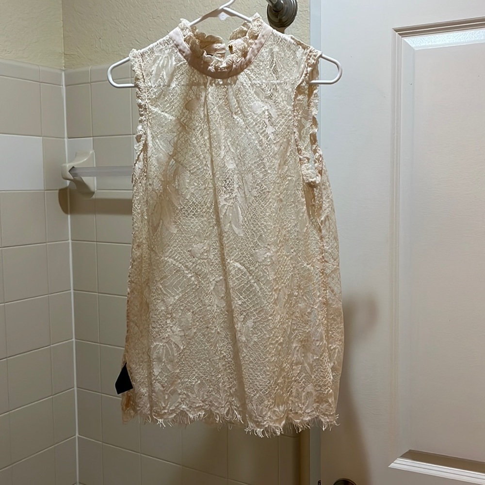 Lace tank top size large. Ivory